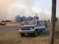 5:03pm Vernon Williams crew watch fire from Landreth's.